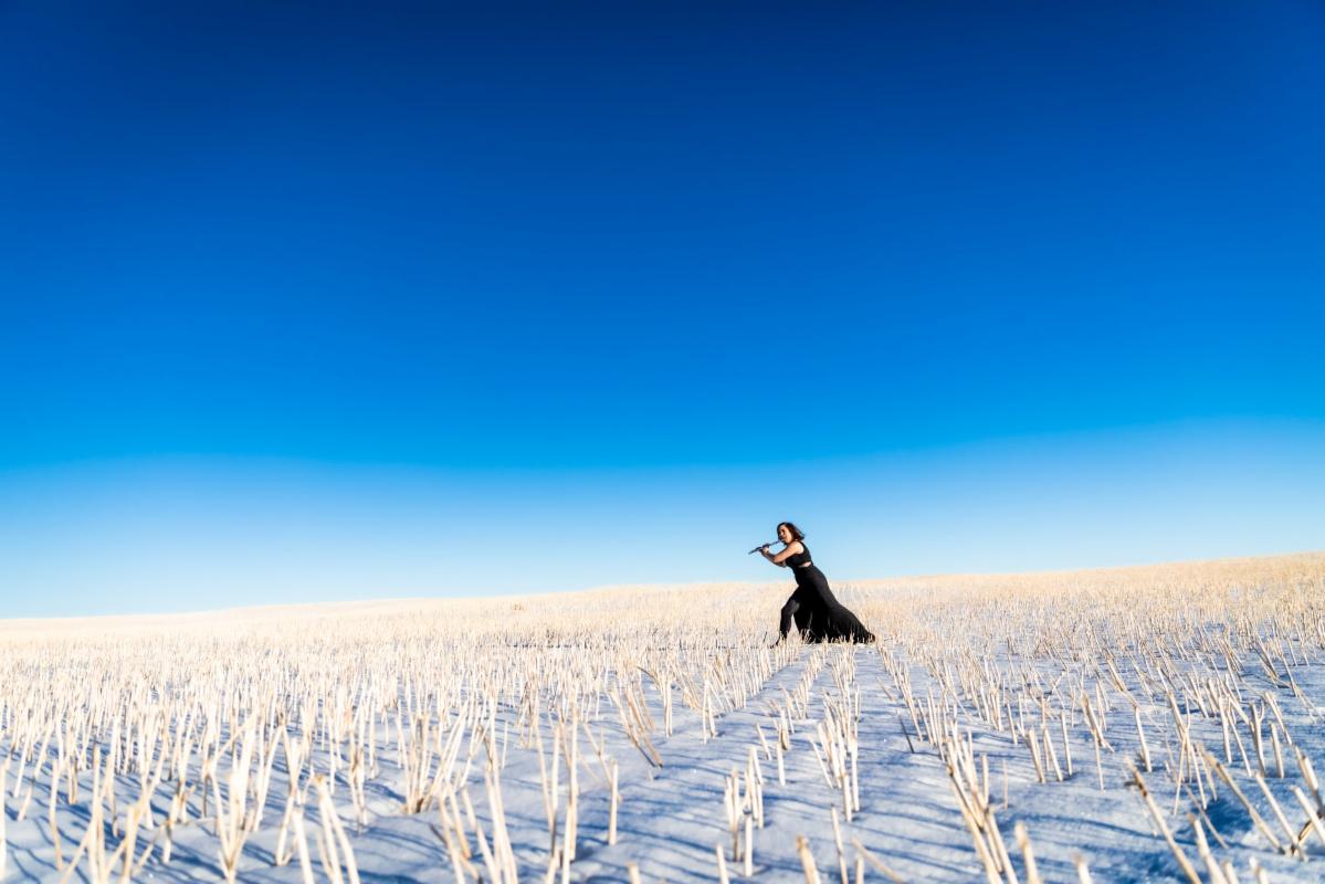 Flutist in the frozen plain (II) height=