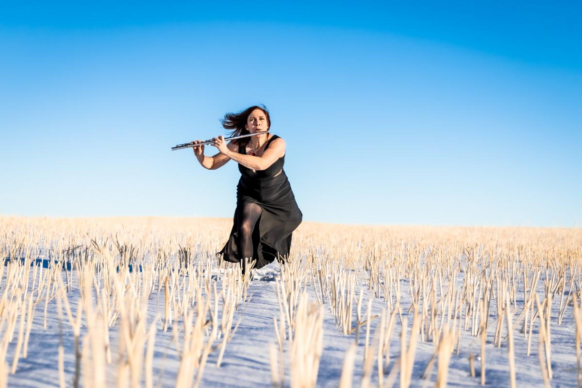 Flutist in the frozen plain (III) height=