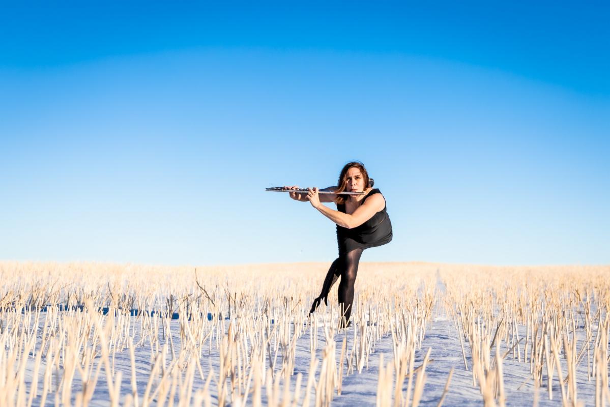 Flutist in the frozen plain (III) height=