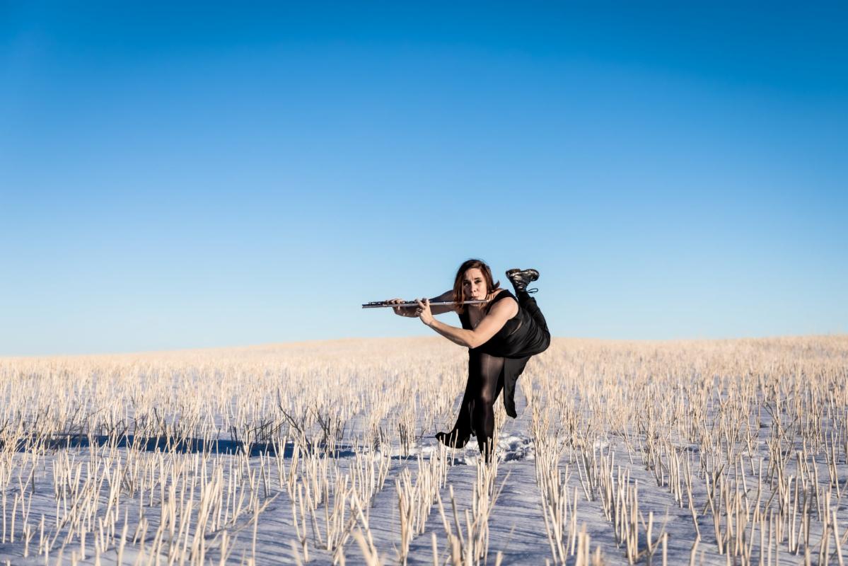 Flutist in the frozen plain height=